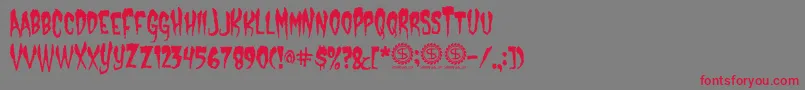 フォントCastleDracustein – 赤い文字の灰色の背景