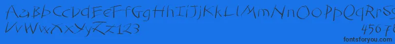 Tomahawked Font – Black Fonts on Blue Background