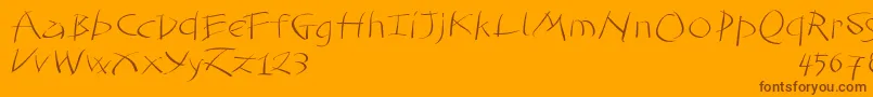 Tomahawked Font – Brown Fonts on Orange Background