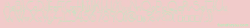 ClarittyOutline-Schriftart – Grüne Schriften auf rosa Hintergrund