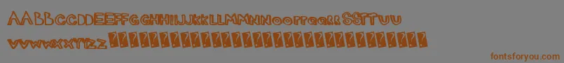 Justmarker Font – Brown Fonts on Gray Background