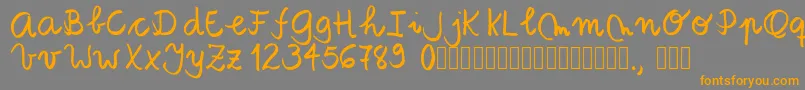 Tanaestelbrushscript01Regular Font – Orange Fonts on Gray Background