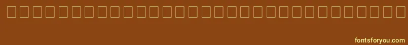 Czcionka Infobubble2 – żółte czcionki na brązowym tle