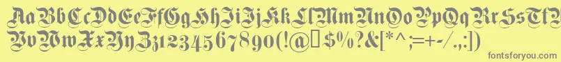 Dsfettekanzleiosf Font – Gray Fonts on Yellow Background