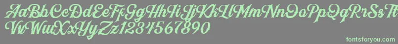 フォントBlackJackScript – 灰色の背景に緑のフォント