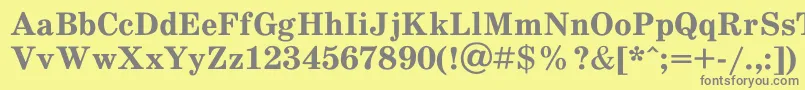 フォントSchooldlBold – 黄色の背景に灰色の文字