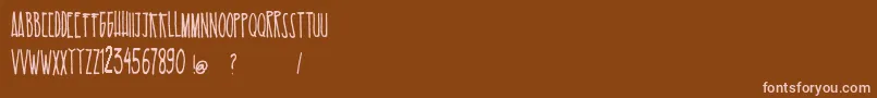EsKelapaMuda Font – Pink Fonts on Brown Background