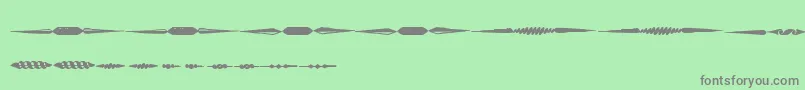 Weitere Informationen zur OldFoundryPrintsTfb-Schriftart OldFoundryPrintsTfb-Schriftart – Graue Schriften auf grünem Hintergrund