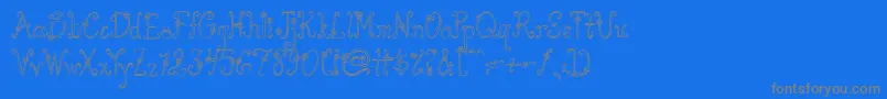 AustieBostYouWearFlowersHollow-Schriftart – Graue Schriften auf blauem Hintergrund