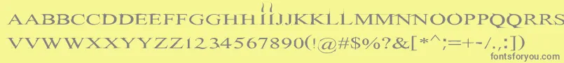 フォントHitman – 黄色の背景に灰色の文字