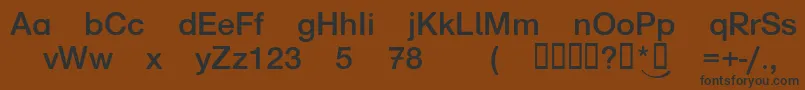 フォントNorddruck – 黒い文字が茶色の背景にあります