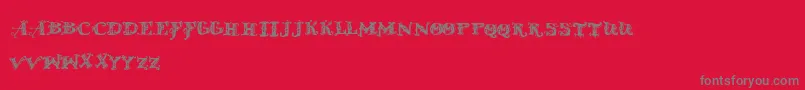 フォントDoldmodern – 赤い背景に灰色の文字