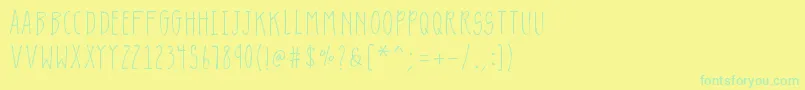 Fonte K26lavendulagray – fontes verdes em um fundo amarelo