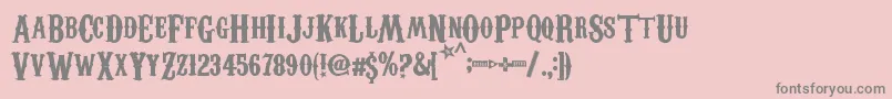 CarnevaleeFreakshow-fontti – harmaat kirjasimet vaaleanpunaisella taustalla