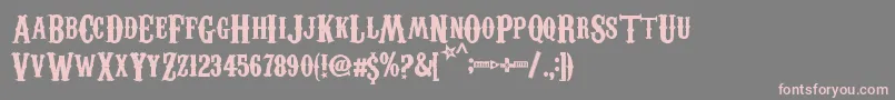 CarnevaleeFreakshow Font – Pink Fonts on Gray Background