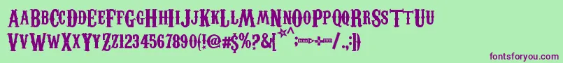 CarnevaleeFreakshow Font – Purple Fonts on Green Background