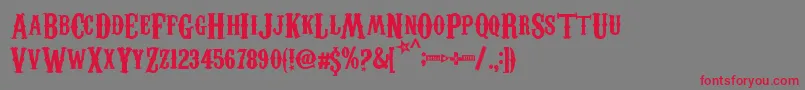 CarnevaleeFreakshow Font – Red Fonts on Gray Background
