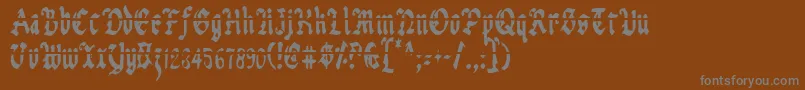 Uberlav2c Font – Gray Fonts on Brown Background