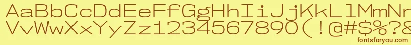 Nk57MonospaceExLt Font – Brown Fonts on Yellow Background