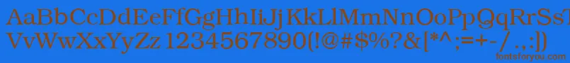 Kacstonefixed-Schriftart – Braune Schriften auf blauem Hintergrund
