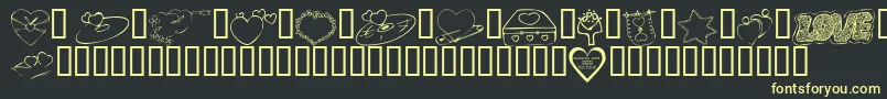 KrValentines2006Seven Font – Yellow Fonts on Black Background