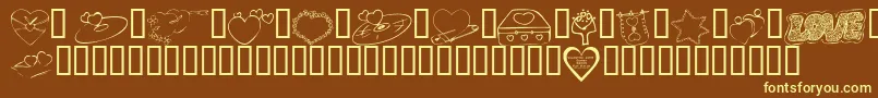 フォントKrValentines2006Seven – 黄色のフォント、茶色の背景