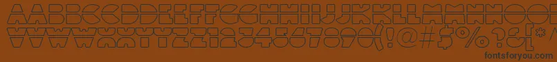 Linotypeblackwhiteoutlinelaser-fontti – mustat fontit ruskealla taustalla
