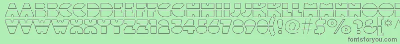 Linotypeblackwhiteoutlinelaser-fontti – harmaat kirjasimet vihreällä taustalla