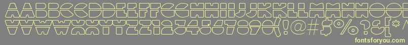 Шрифт Linotypeblackwhiteoutlinelaser – жёлтые шрифты на сером фоне