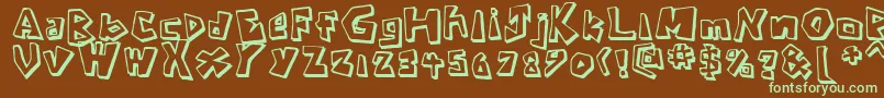 CavemanRegular-fontti – vihreät fontit ruskealla taustalla