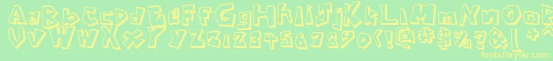 Fonte CavemanRegular – fontes amarelas em um fundo verde