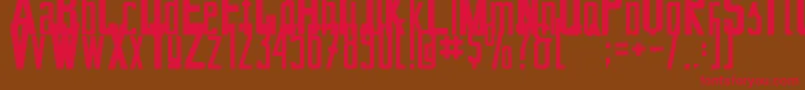 フォントBertaDrug01 – 赤い文字が茶色の背景にあります。