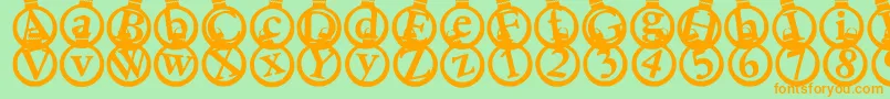 Kerstkaarten Font – Orange Fonts on Green Background