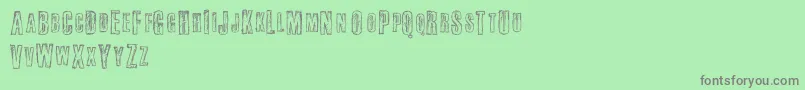 Fail-fontti – harmaat kirjasimet vihreällä taustalla
