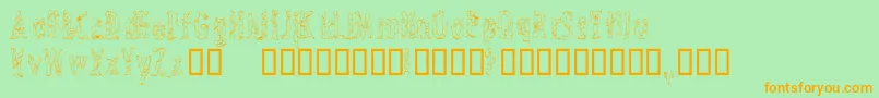 CrossedwiresCondensed-Schriftart – Orangefarbene Schriften auf grünem Hintergrund