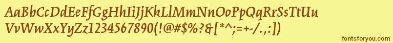 フォントKinesisstdSemibolditalic – 茶色の文字が黄色の背景にあります。