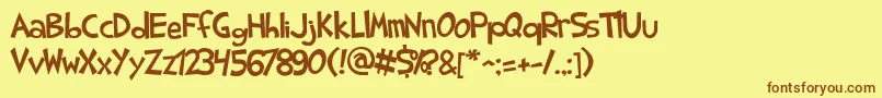 Fonte SharkRandomFunnyness – fontes marrons em um fundo amarelo
