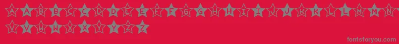 EstrelladoTfb-Schriftart – Graue Schriften auf rotem Hintergrund