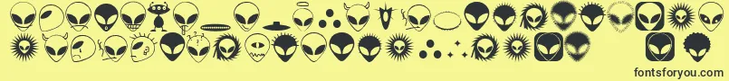 Alienator Font – Black Fonts on Yellow Background