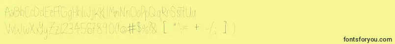 Kaleidescope Font – Black Fonts on Yellow Background