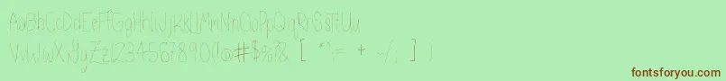 Kaleidescope-Schriftart – Braune Schriften auf grünem Hintergrund