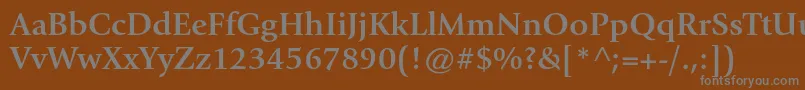 GiovannistdBold-fontti – harmaat kirjasimet ruskealla taustalla
