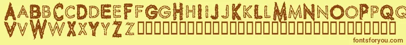 SpikeCrumbGeiger Font – Brown Fonts on Yellow Background