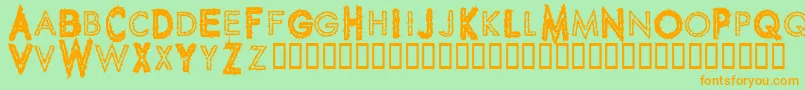 SpikeCrumbGeiger Font – Orange Fonts on Green Background