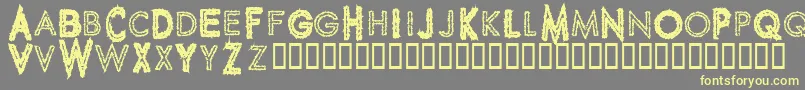 SpikeCrumbGeiger-fontti – keltaiset fontit harmaalla taustalla