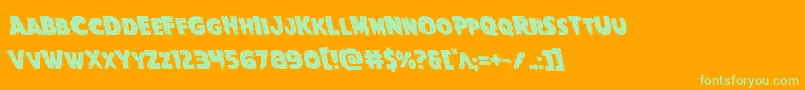Goblincreekleft-Schriftart – Grüne Schriften auf orangefarbenem Hintergrund