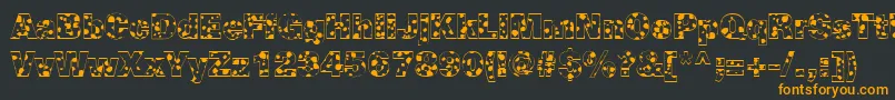 CowSpotsRegular Font – Orange Fonts on Black Background