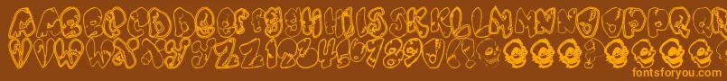 フォントChankenstein – オレンジ色の文字が茶色の背景にあります。