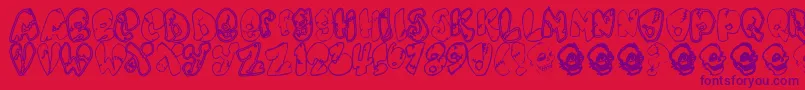 Шрифт Chankenstein – фиолетовые шрифты на красном фоне