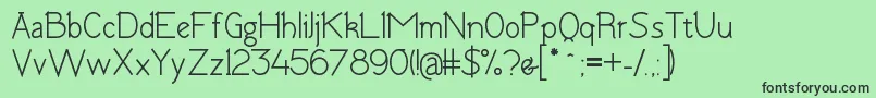 TomskBold Font – Black Fonts on Green Background